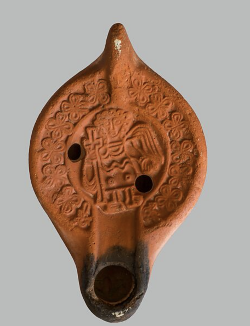 Oil Lamp with Angel, late 6th century–first quarter 7th century (North African; Tunisia), African Red Slip Ware, 13.8 x 8.5 x 4.2 cm (National Museum of Carthage)
